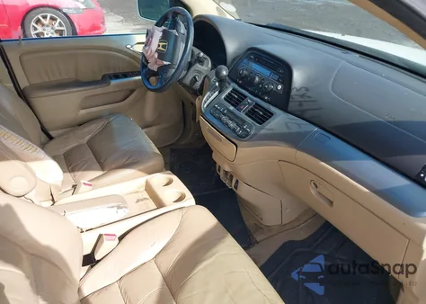 2010 Honda Odyssey Ex-L z USA, uszkodzony, nr VIN 5FNRL3H69AB041089